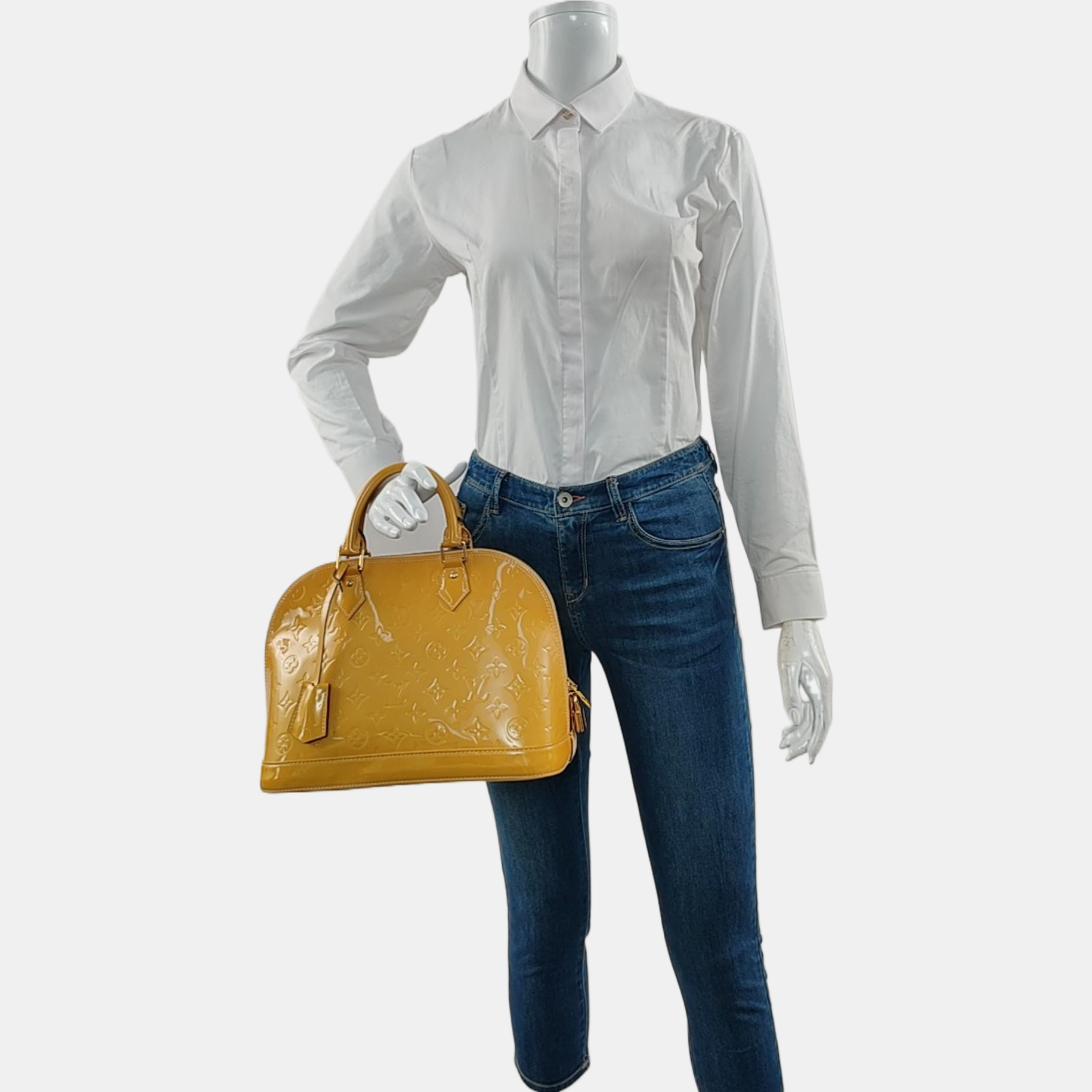 Authenticated pre-owned  Alma PM Monogram Patent Leather Yellow - Top Handle Bag at Looply