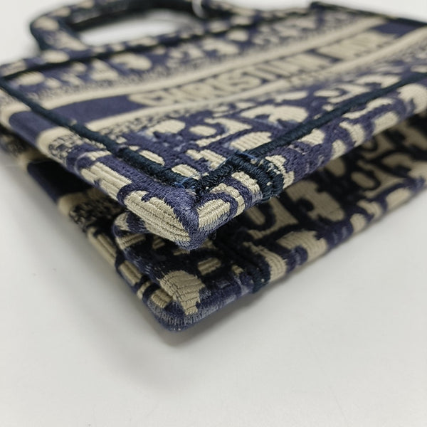 Authenticated pre-owned  Book Tote Mini Monogram Canvas Blue - Top Handle Bag at Looply