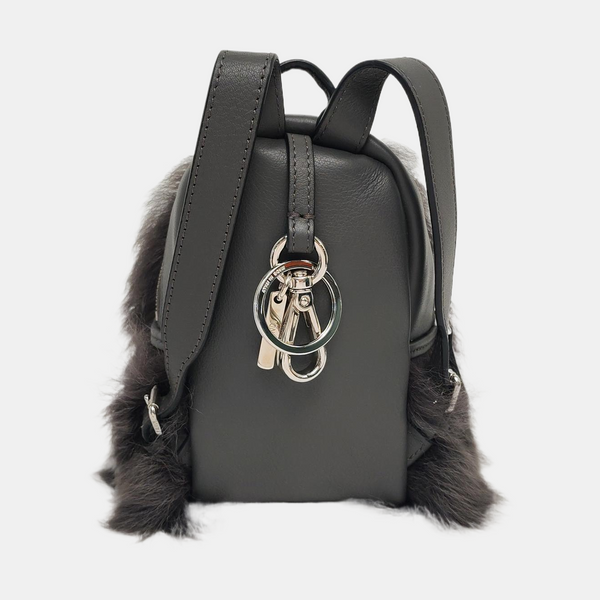 Authenticated pre-owned  Monster Calfskin Gray - Clutch at Looply