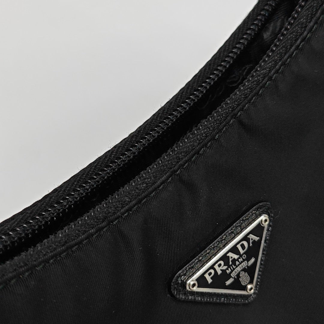 Authenticated pre-owned  Re-edition2000 Mini Nylon Black - Top Handle Bag at Looply