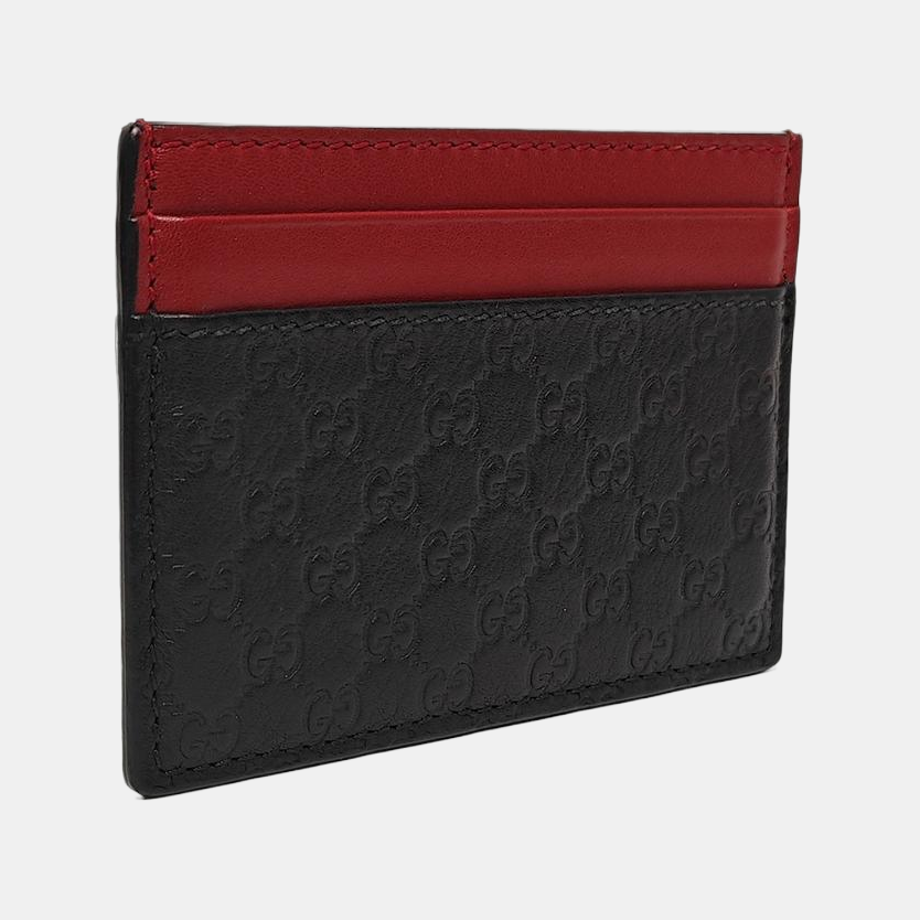 Authenticated pre-owned  Microguccissima Monogram Calfskin Black Card Holder - Card Holder at Looply