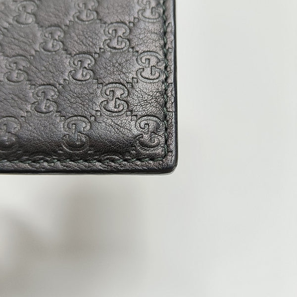 Authenticated pre-owned  Microguccissima Monogram Calfskin Black Card Holder - Card Holder at Looply