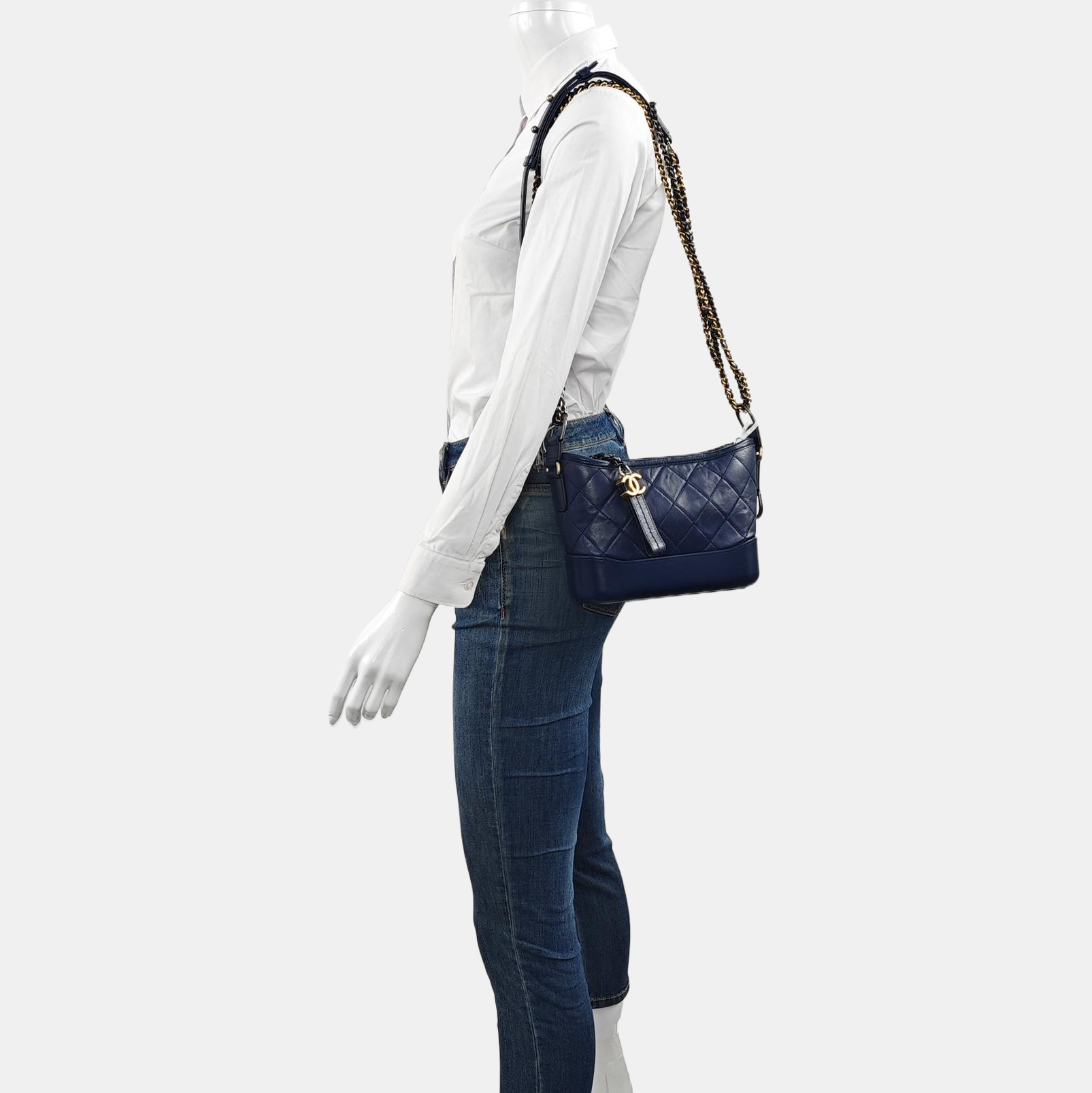 Authenticated pre-owned  Gabrielle Small Quilted Calfskin Blue - Clutch at Looply