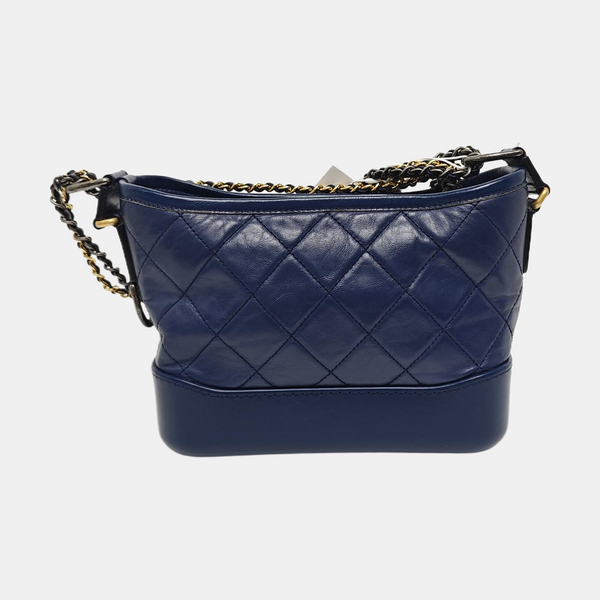 Authenticated pre-owned  Gabrielle Small Quilted Calfskin Blue - Clutch at Looply
