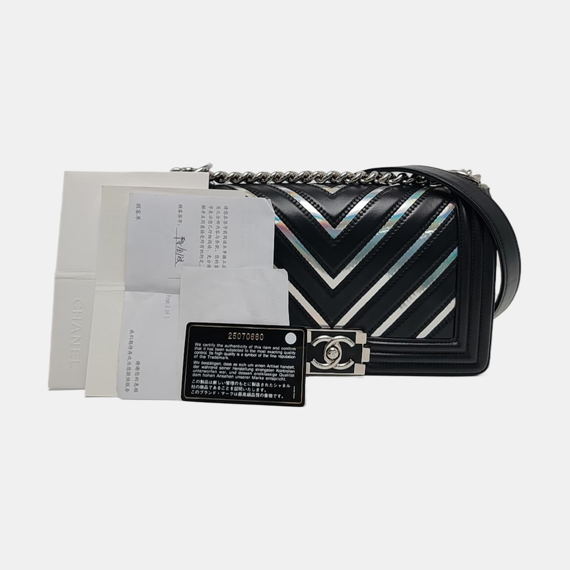 Authenticated pre-owned  Boy Chanel Medium Chevron Calfskin Black - Shoulder Bag at Looply