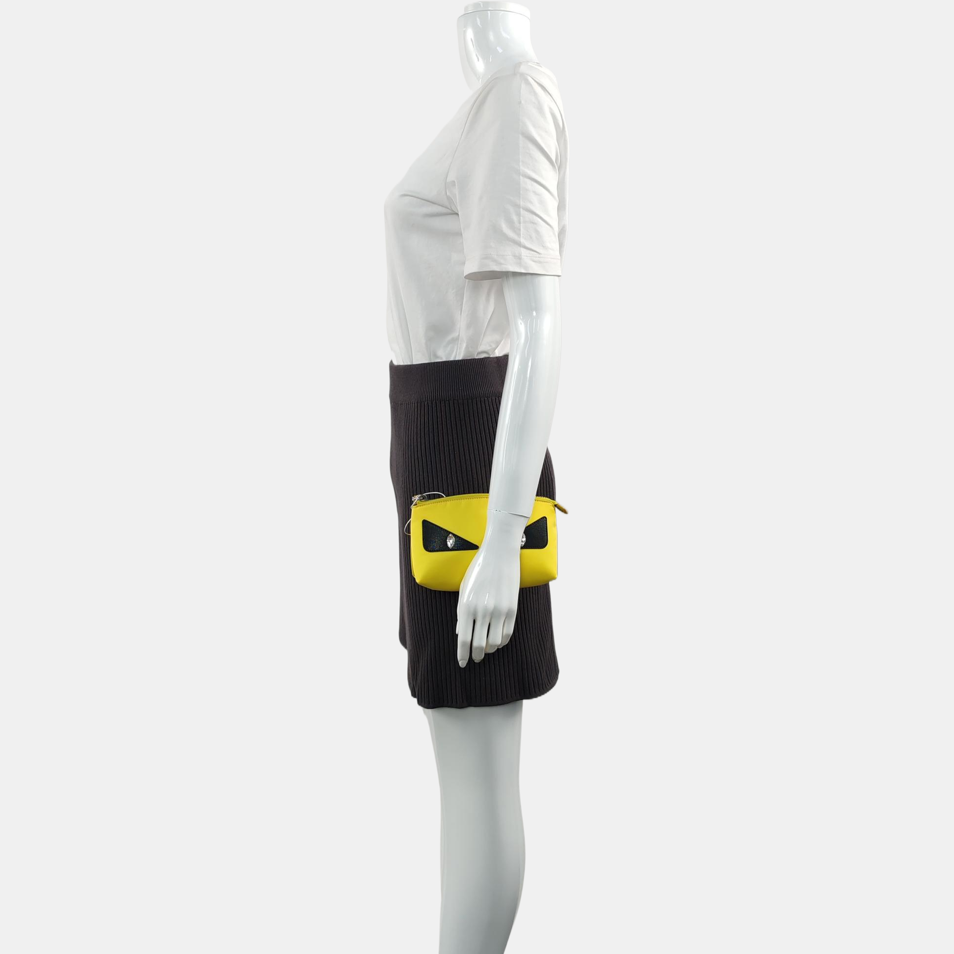 Authenticated pre-owned  Monster Nylon Yellow - Clutch at Looply