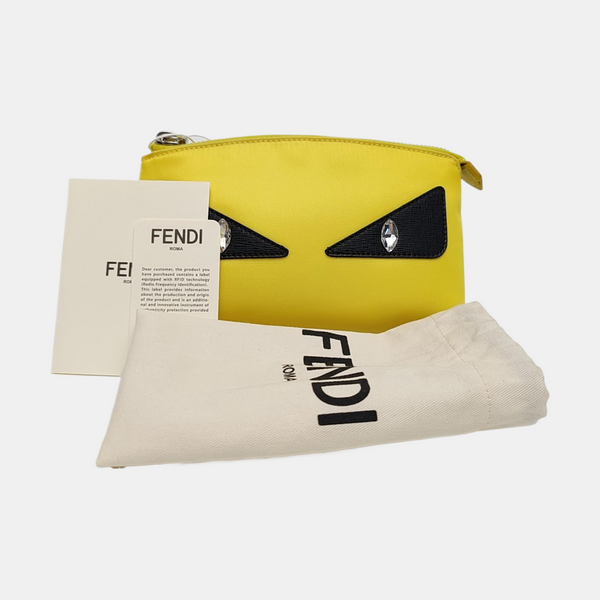 Authenticated pre-owned  Monster Nylon Yellow - Clutch at Looply