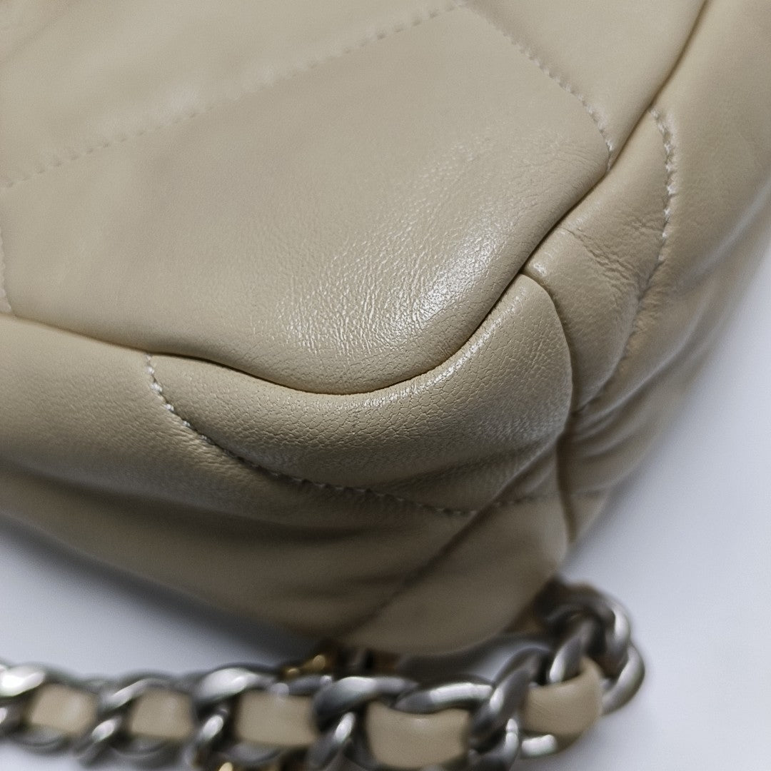 Authenticated pre-owned  Chanel 19 Quilted Lambskin Beige - Shoulder Bag at Looply