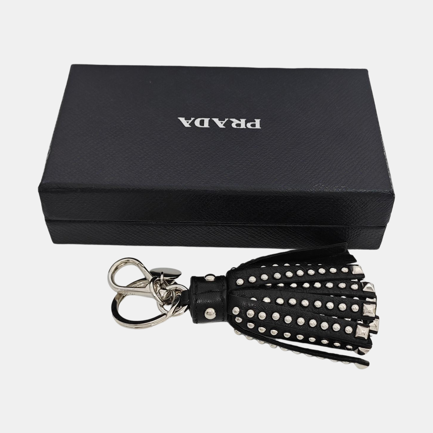 Authenticated pre-owned  Leather Black Bag Charm - Bag Charm at Looply