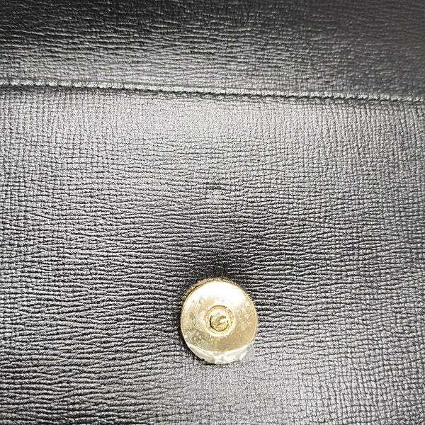 Authenticated pre-owned  GG Marmont Calfskin Black - Clutch at Looply