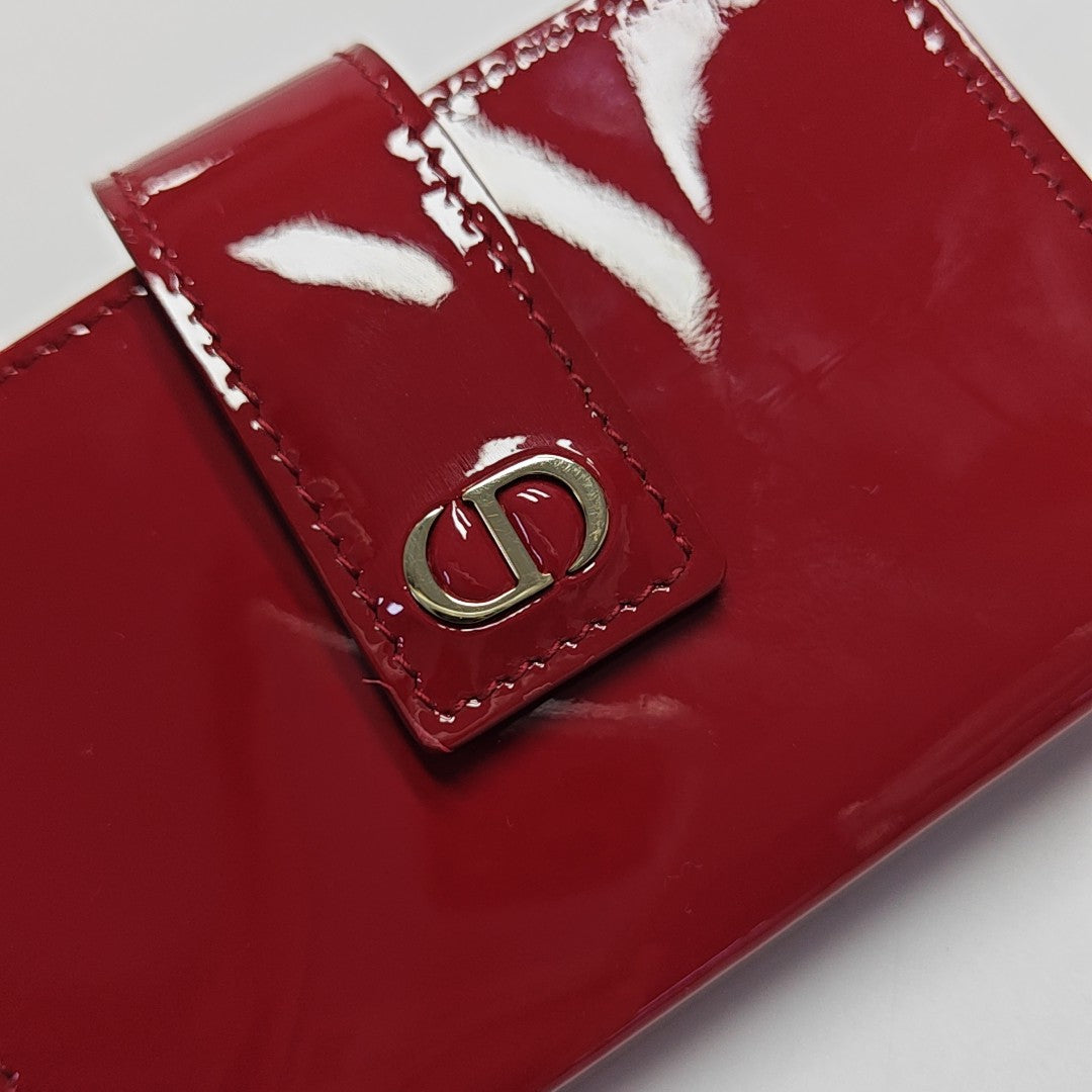Authenticated pre-owned  30 Montaigne Calfskin Red Card Holder - Card Holder at Looply