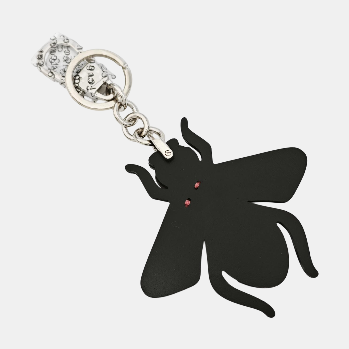 Authenticated pre-owned  Black-tone Metal Bag Charm - Bag Charm at Looply
