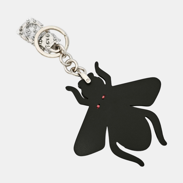 Authenticated pre-owned  Black-tone Metal Bag Charm - Bag Charm at Looply