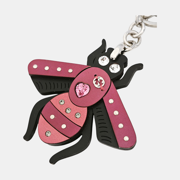 Authenticated pre-owned  Black-tone Metal Bag Charm - Bag Charm at Looply