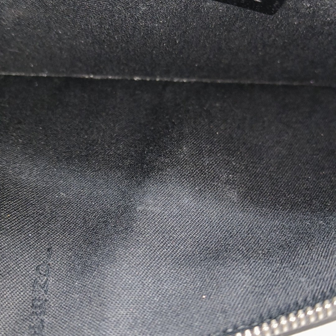 Authenticated pre-owned  Karlito Calfskin Black - Clutch at Looply