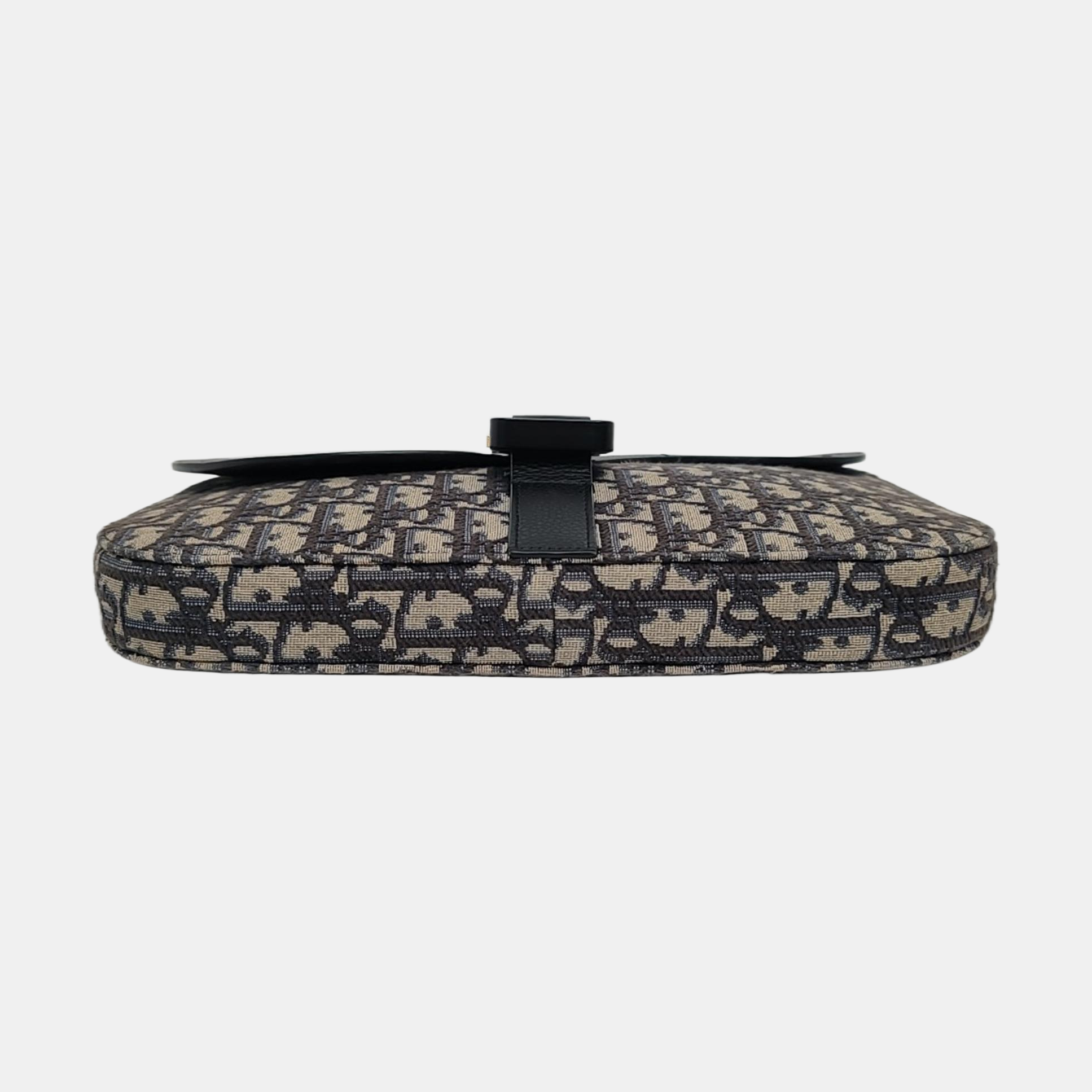 Authenticated pre-owned  Saddle Oblique Canvas Beige - Clutch at Looply
