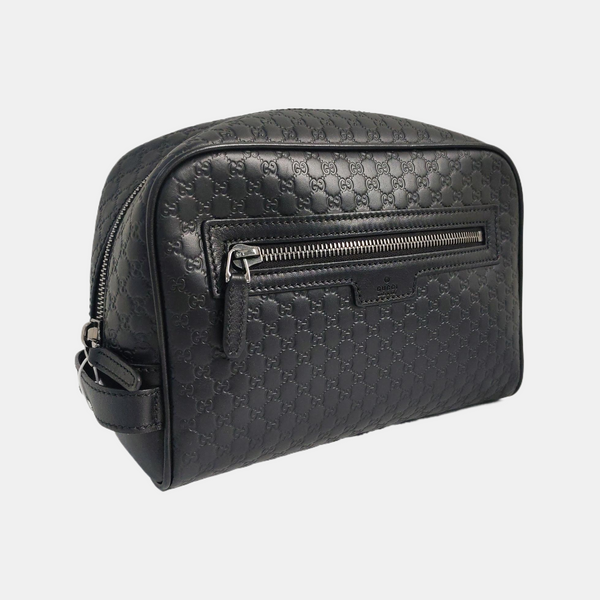 Authenticated pre-owned  Microguccissima Monogram Calfskin Black - Clutch at Looply