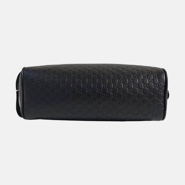 Authenticated pre-owned  Microguccissima Monogram Calfskin Black - Clutch at Looply