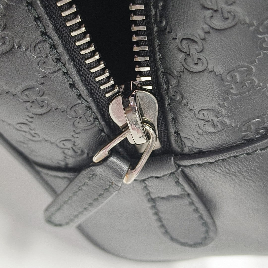 Authenticated pre-owned  Microguccissima Monogram Calfskin Black - Clutch at Looply