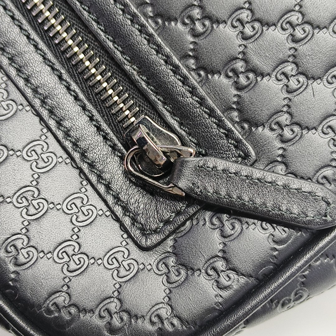 Authenticated pre-owned  Microguccissima Monogram Calfskin Black - Clutch at Looply