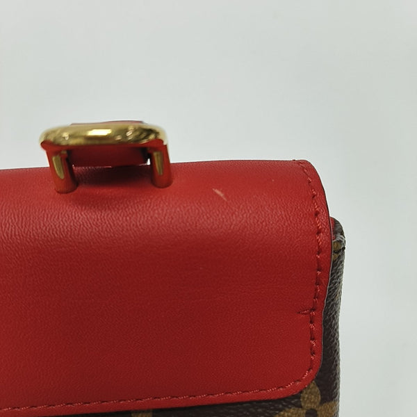 Authenticated pre-owned  Locky BB Monogram Coated Canvas Red - Shoulder Bag at Looply
