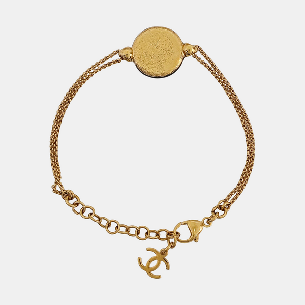 Pulsera de metal dorado