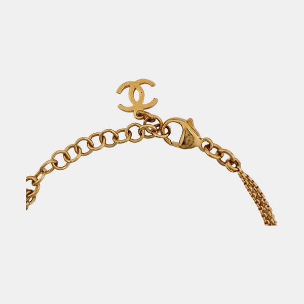 Pulsera de metal dorado