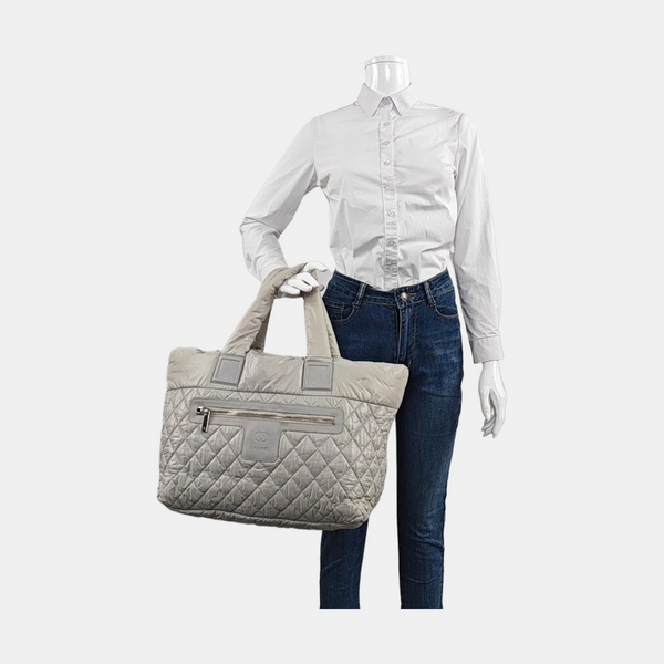 Authenticated pre-owned  Coco Cocoon Quilted Nylon Gray - Top Handle Bag at Looply