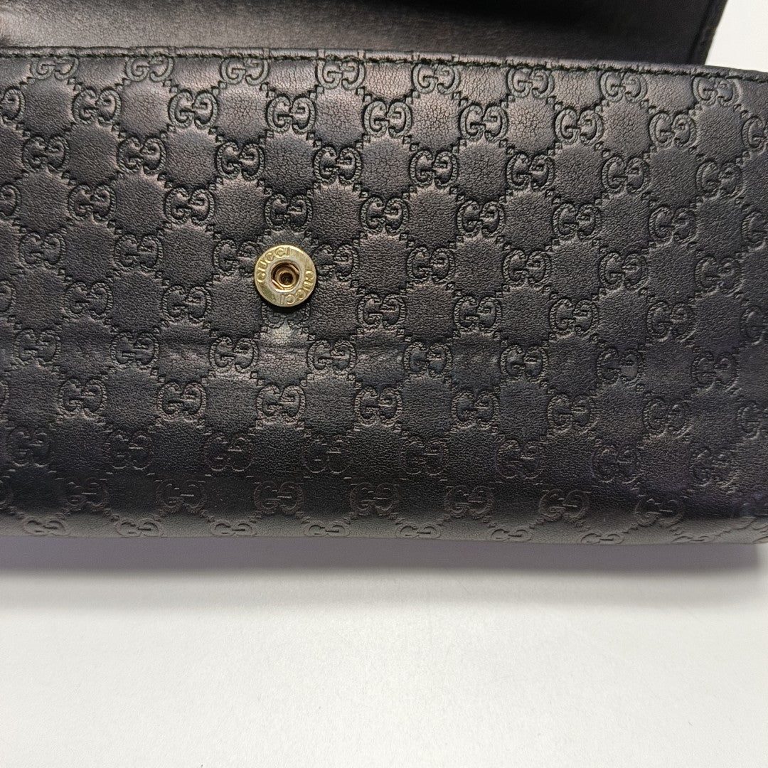 Authenticated pre-owned  Microguccissima Monogram Calfskin Black Wallet - Wallet at Looply