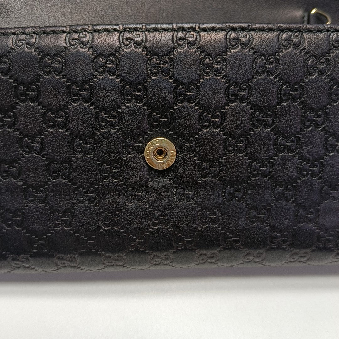 Authenticated pre-owned  Microguccissima Monogram Calfskin Black Wallet - Wallet at Looply