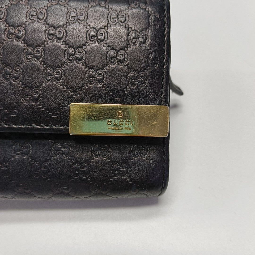Authenticated pre-owned  Microguccissima Monogram Calfskin Black Wallet - Wallet at Looply