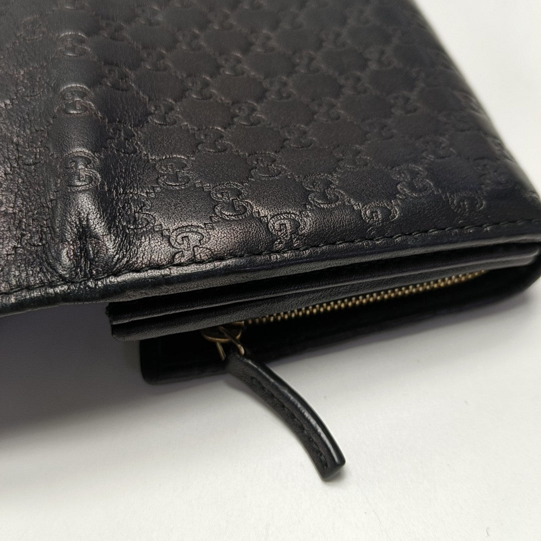 Authenticated pre-owned  Microguccissima Monogram Calfskin Black Wallet - Wallet at Looply