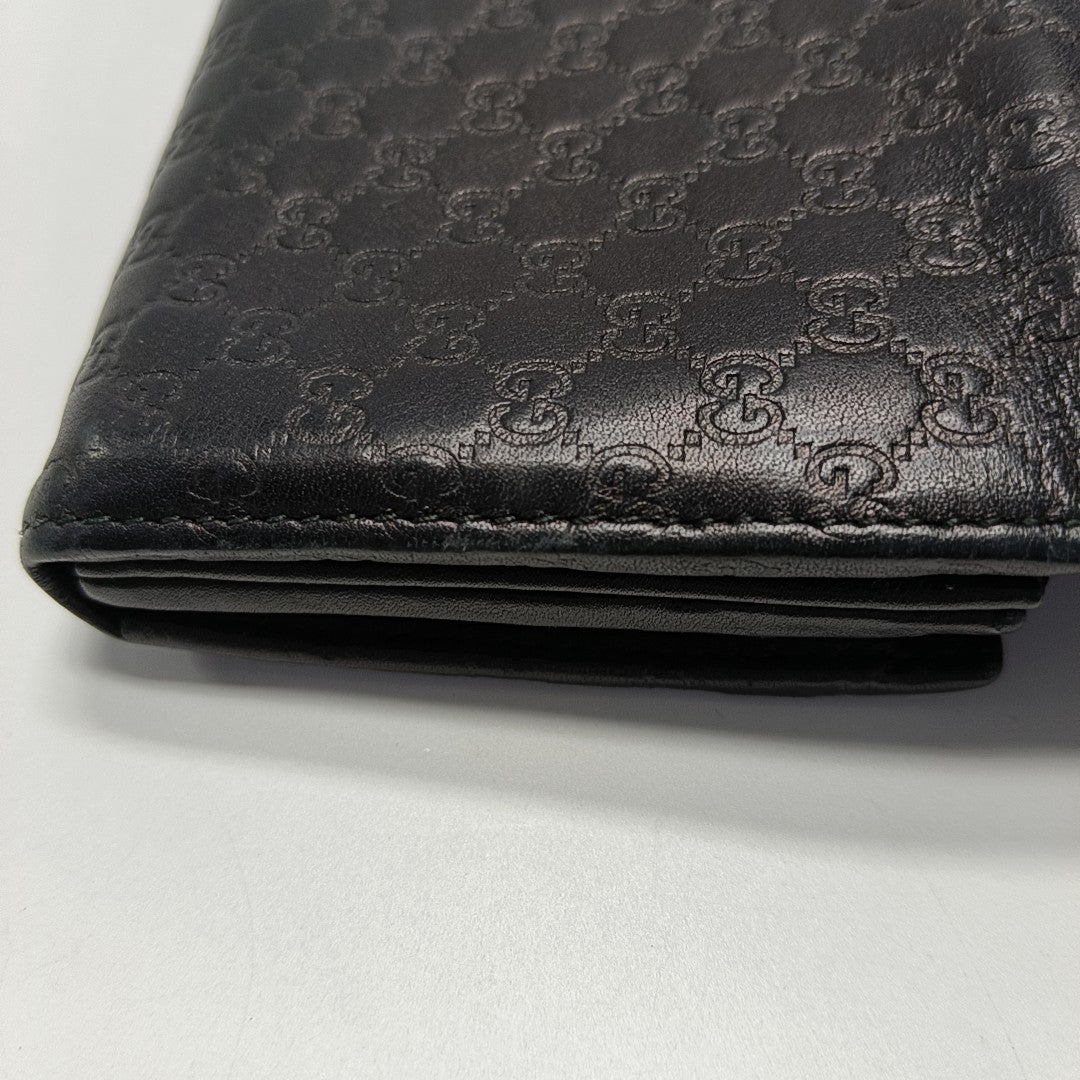 Authenticated pre-owned  Microguccissima Monogram Calfskin Black Wallet - Wallet at Looply