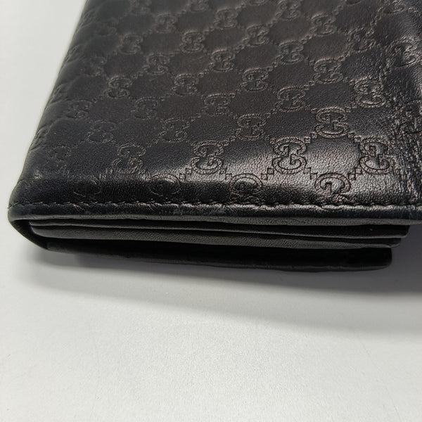 Authenticated pre-owned  Microguccissima Monogram Calfskin Black Wallet - Wallet at Looply