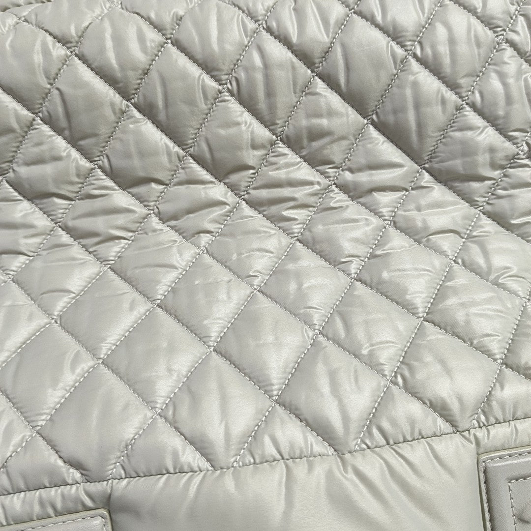 Authenticated pre-owned  Coco Cocoon Quilted Nylon Gray - Top Handle Bag at Looply