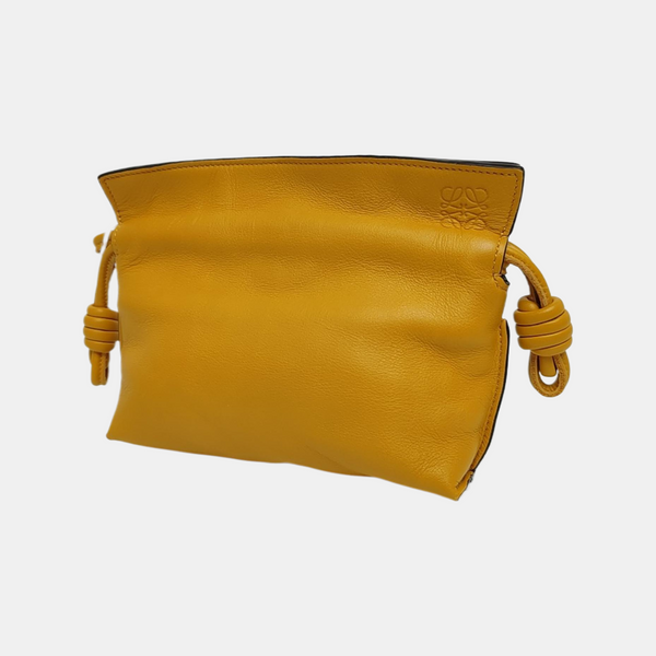 Authenticated pre-owned  Flamenco Calfskin Yellow - Clutch at Looply
