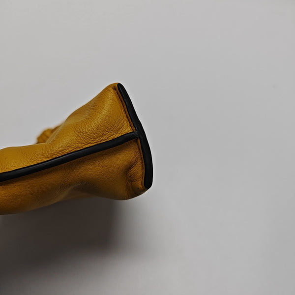 Authenticated pre-owned  Flamenco Calfskin Yellow - Clutch at Looply