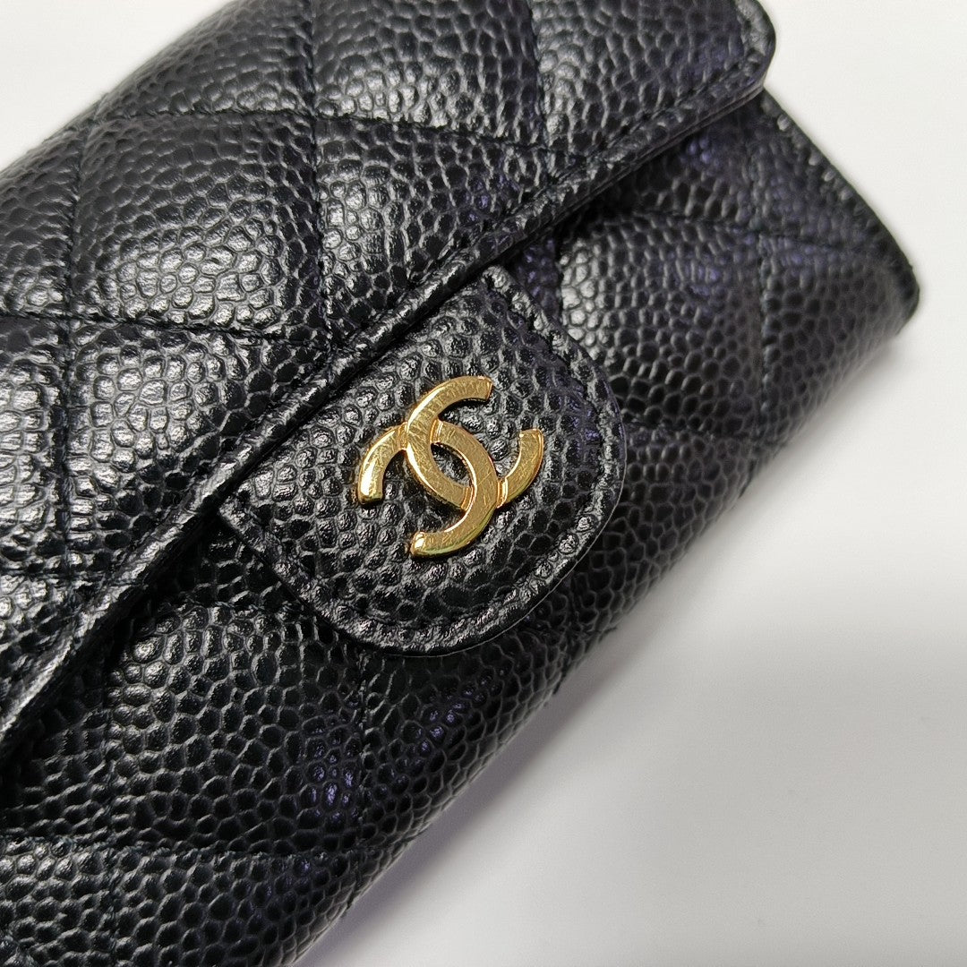 Authenticated pre-owned  Classic Flap Quilted Grained Calfskin Black Wallet - Wallet at Looply