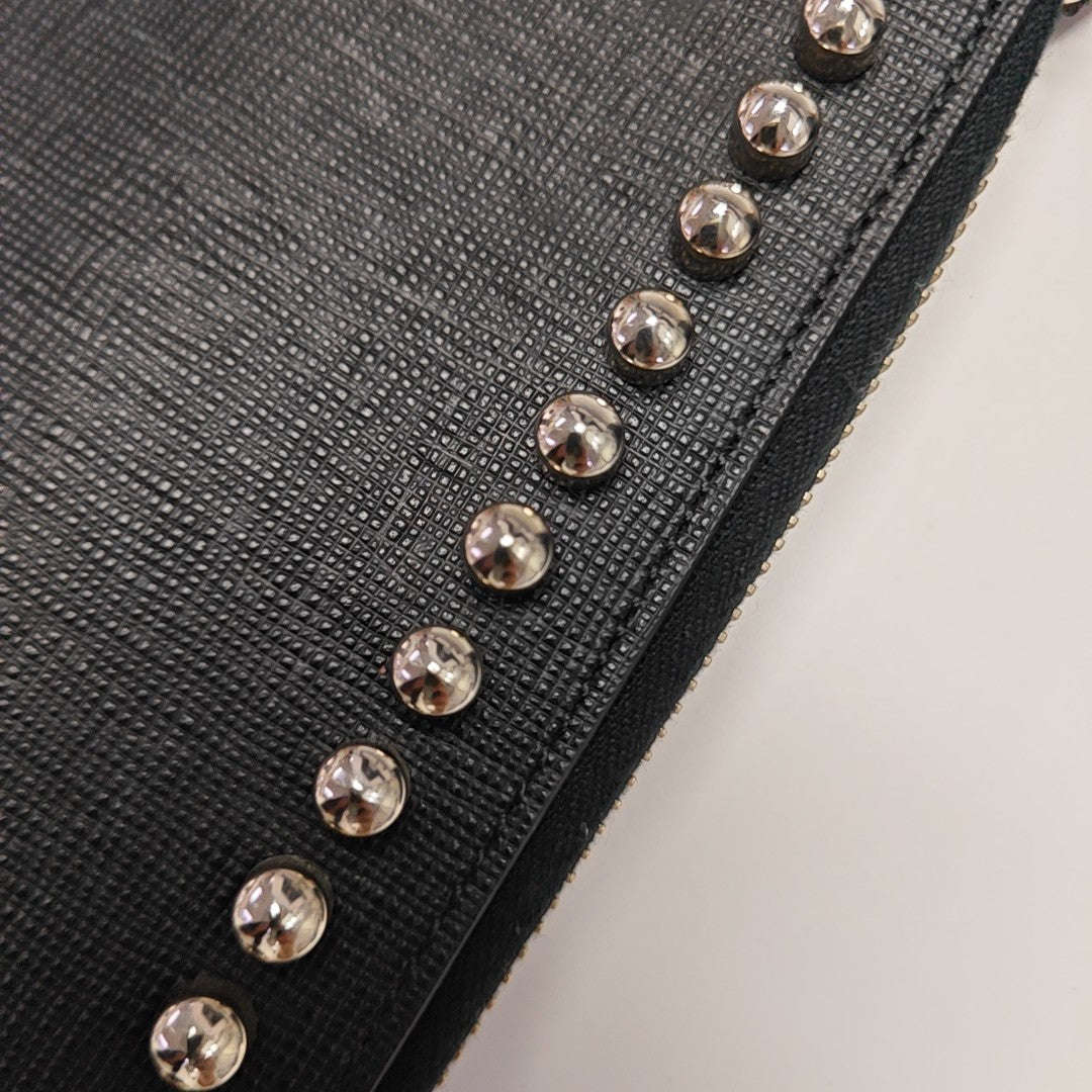 Authenticated pre-owned  Karlito Calfskin Black - Clutch at Looply