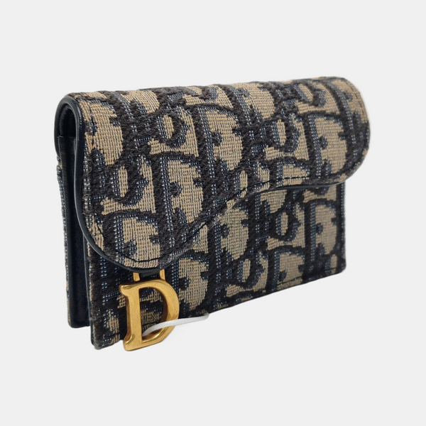 Authenticated pre-owned  Saddle Oblique Canvas Blue Card Holder - Card Holder at Looply