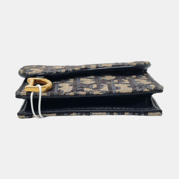 Authenticated pre-owned  Saddle Oblique Canvas Blue Card Holder - Card Holder at Looply