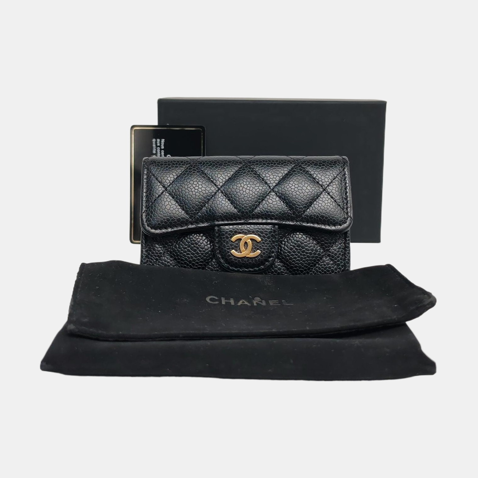 Authenticated pre-owned  Classic Flap Quilted Grained Calfskin Black - Clutch at Looply