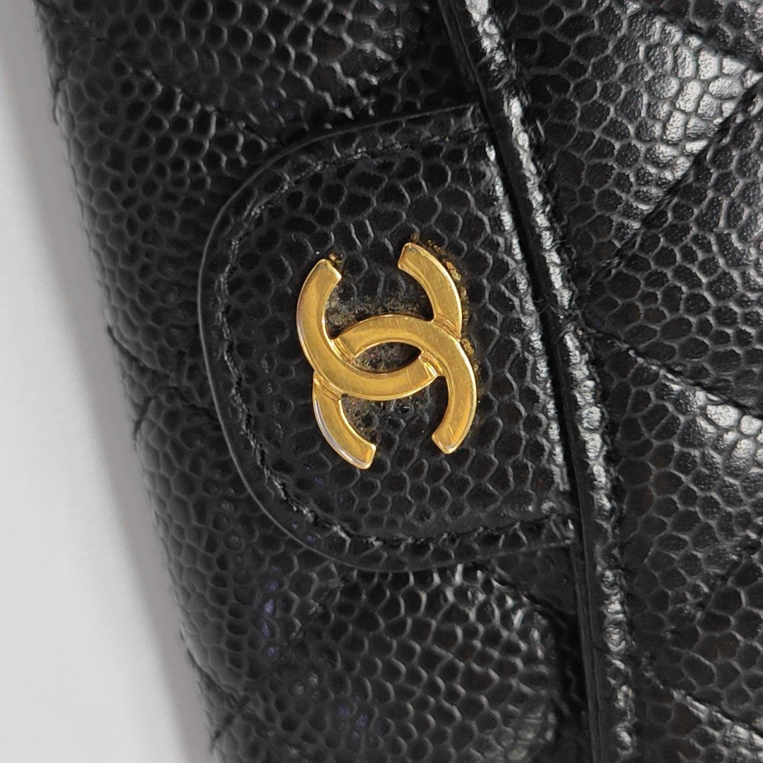 Authenticated pre-owned  Classic Flap Quilted Grained Calfskin Black - Clutch at Looply