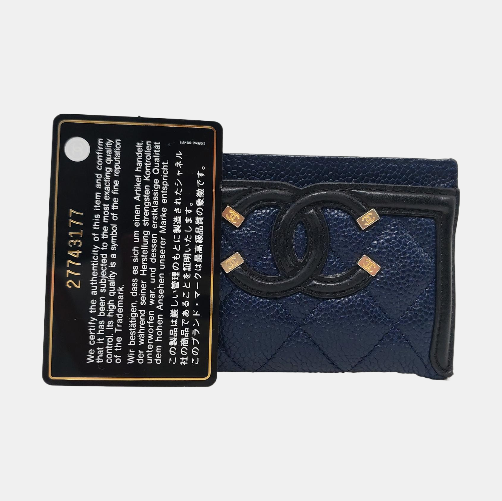 Authenticated pre-owned  Filigree Quilted Grained Calfskin Blue Card Holder - Card Holder at Looply