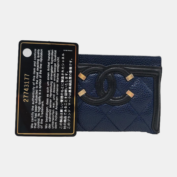 Authenticated pre-owned  Filigree Quilted Grained Calfskin Blue Card Holder - Card Holder at Looply