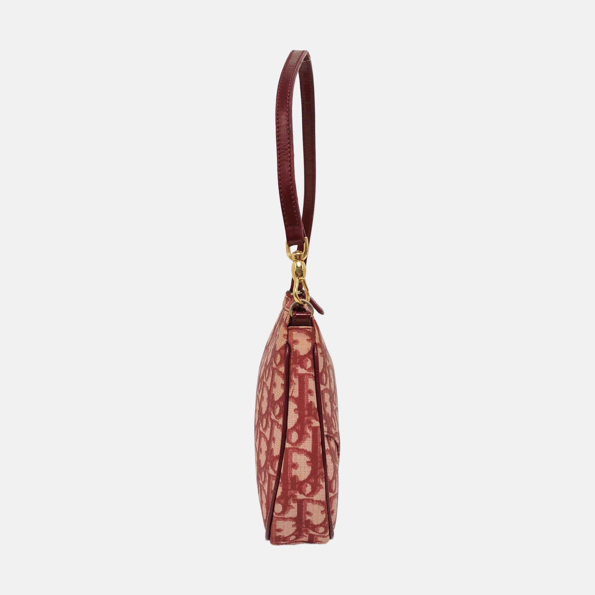 Authenticated pre-owned  Saddle Oblique Canvas Red - Top Handle Bag at Looply