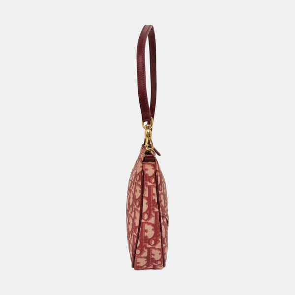 Authenticated pre-owned  Saddle Oblique Canvas Red - Top Handle Bag at Looply
