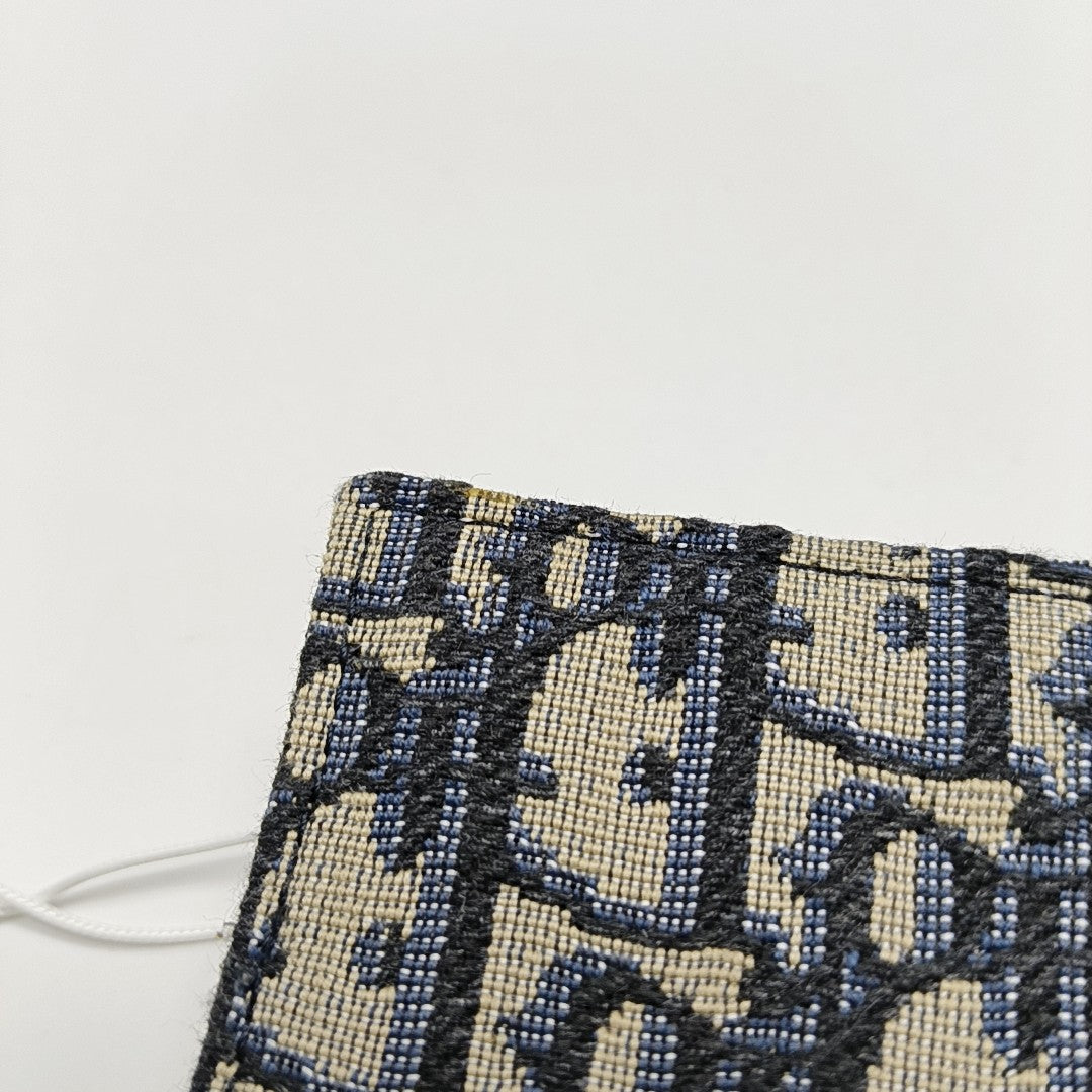Authenticated pre-owned  Saddle Oblique Fabric Blue Card Holder - Card Holder at Looply