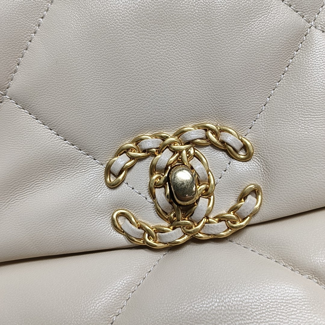 Authenticated pre-owned  Chanel 19 Small Quilted Lambskin Beige - Shoulder Bag at Looply