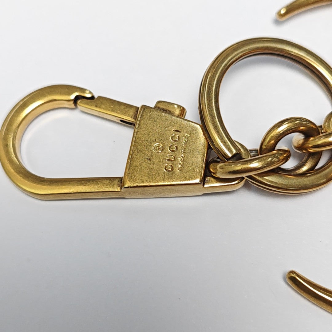Authenticated pre-owned  Gold-tone Metal Bag Charm - Bag Charm at Looply